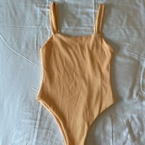 Orange one piece swimsuit